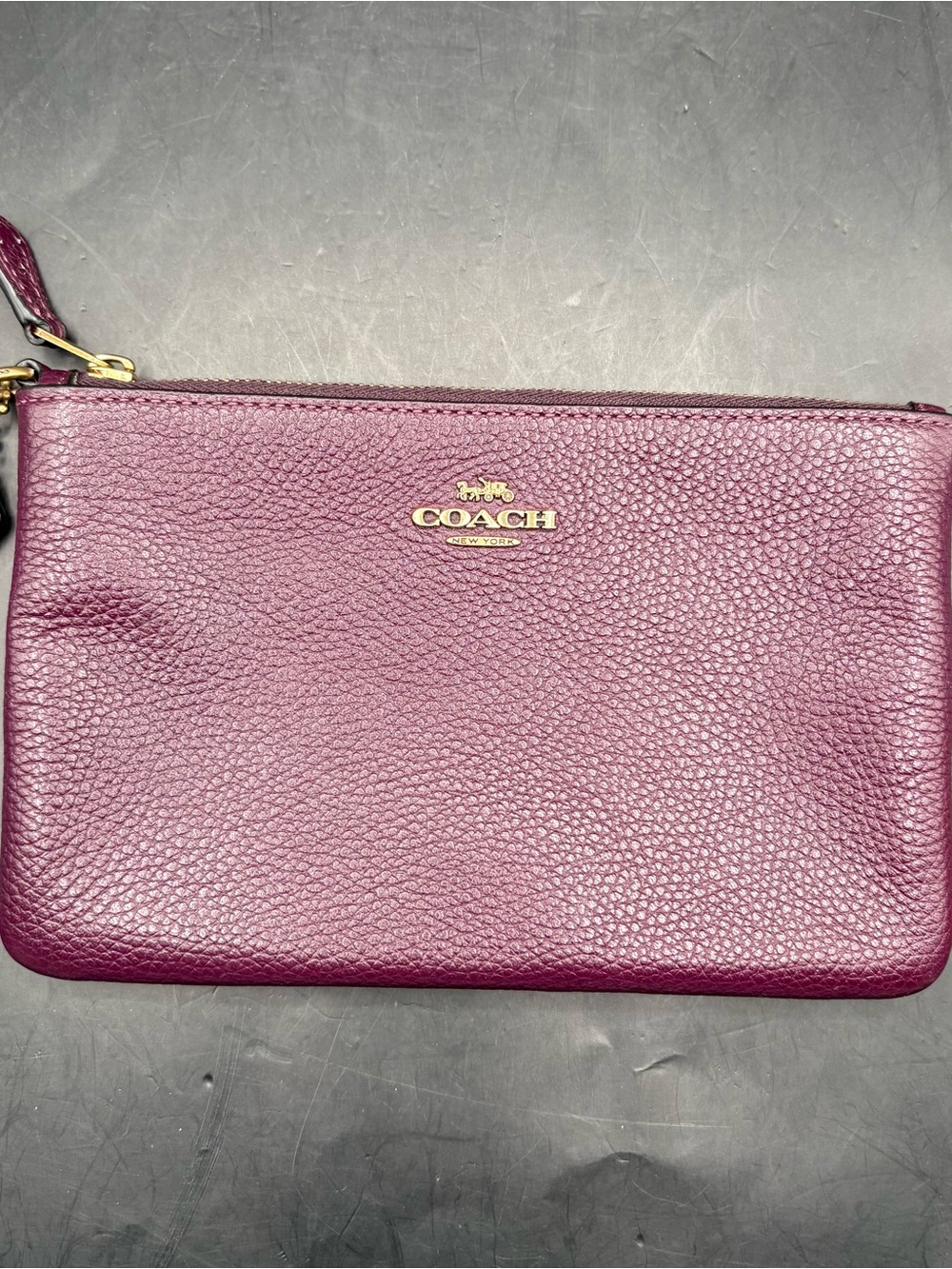 COACH Pebbled Leather Wristlet in Plum